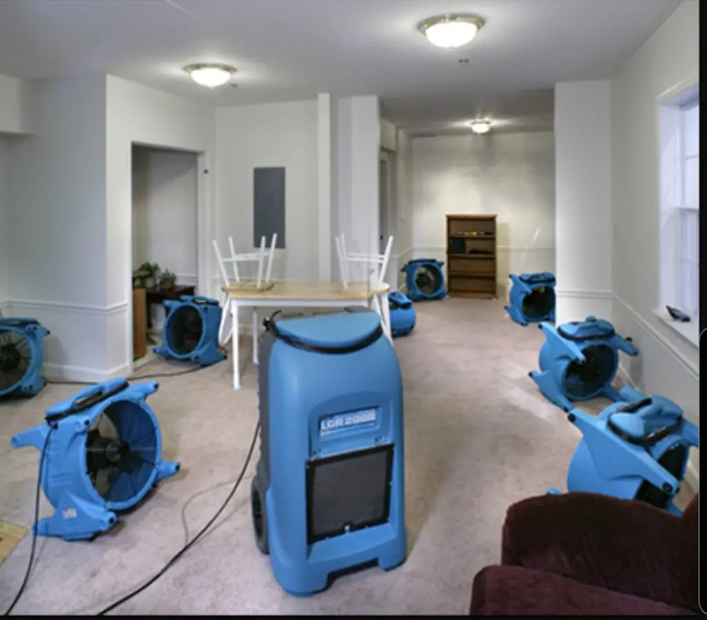 Air movers and dehumidifier setup for Water Damage Restoration in East Marlborough